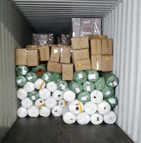 LCL consolidated paper bags and kraft paper rolls loaded into a container at Ningbo warehouse, September 2026